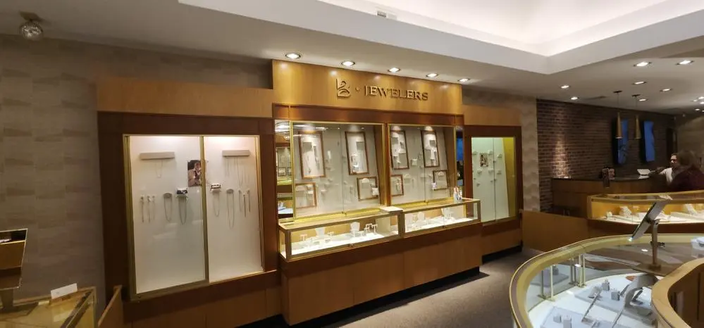 Jewelry store showroom with ceiling and display case lighting